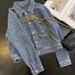 Heavy Duty Color Blocked Denim Jacket Loose Fitting Embroidered Rabbit And Letter Details Absolutely Stunning Perfect For Early Spring_mkmklike.com