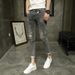 American High Street Ripped Jeans Men's Trendy Brand Ruffian Handsome Graffiti Scratched Patch Elastic Slim Small Feet Trousers_mkmklike.com