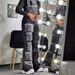 Women's Clothing Fashion Street Shot Sequin Tassel Design Flared Jeans_mkmklike.com
