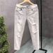 Men's Clothing Retro Washed And Distressed Light Colored Ripped Jeans For Men Trendy Slim Fit Cropped Style Jeans_mkmklike.com