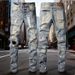 Unisex Y2K Flared Jeans, Light Blue Mud Fade, Black & White Splatter, One Ripped Knee, Breathable Summer_mkmklike.com
