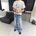 Korea "Glacier Ripples" Ice Blue Washed Old Tall Ounce Cat Beard Wide A-shaped Wide Leg Jeans Men And Women_mkmklike.com