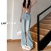 2025 New Guangzhou Xintang Washed Blue Micro Flare Jeans For Women, High Waist, Slimming, Height-Enhancing, Cotton_mkmklike.com