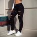 Women's Ripped Skinny Jeans – High-Waisted Stretch Denim With Distressed Details & Belt Loops (Black)_mkmklike.com