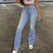 Women's High-Waisted Distressed Flare Jeans – Vintage Light Blue Denim, Boho Streetwear (Ripped Knee, Retro Bell Bottoms, Comfort Fit)_mkmklike.com
