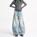LKTM Vintage Wide-Leg Distressed Denim Jeans Asymmetrical Hem Patchwork Detail Retro American Style for Men And Women_mkmklike.com