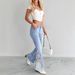 MH2026 Women's Low Rise Flared Jeans Lace Trimmed Light Blue Washed Hollowed out European American Style Denim_mkmklike.com