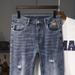 Large Size Men's Clothing Spring And Summer Thin Large Size Jeans Men's Elastic Washed Ripped Jeans Retro Versatile Men's Pants_mkmklike.com