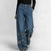 High-Waisted Loose-Fitting Cutout Jeans Metallic Eyelets Hollowed out Detail Wholesale Denim Trousers_mkmklike.com