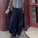 "Vintage-Inspired Wide-Leg Jeans – Relaxed Fit With Curved Hem | Unisex Baggy Trousers For Effortless Style"_mkmklike.com