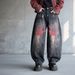 Men's Clothing Men's Trendy Black Washed Graffiti Jeans American Style Loose Fit Straight Leg Curved Blade Design_mkmklike.com