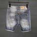 Men's Slim Fit Denim Jeans Simple Embroidered Maple Leaf Ripped Trendy Five Point Pants Versatile Summer Style_mkmklike.com