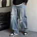 New Eco-friendly Fabric Ripped Scimitar Jeans Men's 2026 Autumn New Trendy Brand Loose Straight Versatile Casual Wide-leg Trousers_mkmklike.com
