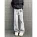 "Men's High Street Washed Jeans – Distressed & Deconstructed Straight-Leg Pants With Artistic Prints | Micro Flare & Avant-Garde Denim"_mkmklike.com