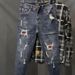 Fashion 2025 Luxury Fashion Men's Pants Korean Style Jeans Washed With Cat Whisker Holes Colorful Paint Splatters Slim Trousers_mkmklike.com