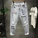 New Style Japanese Loose Brushed Ripped Beggar's Pants Men's Trendy Light Wash Nine-point Jeans For Men_mkmklike.com