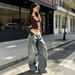 Women's Vintage Distressed Washed Deconstructed Jeans mid Rise Ribbed Waist Visible Stitching Pleats Wide Leg Silhouette_mkmklike.com