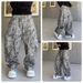 Men's Clothing Vintage Leopard Print Flared Jeans – 90s Streetwear Distressed Denim With Raw Hem & Splatter Wash (Unisex Oversized Fit, Non-Stretch)_mkmklike.com