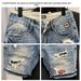 Men's Distressed Denim Shorts – Vintage Washed Light Blue Ripped Patchwork Shorts With Cat Whisker Details_mkmklike.com