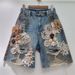 2025 Summer New Niche Lace Flower Stitching Drawing Hole Rhinestone Back Elastic Waist Trendy Cool Denim Shorts_mkmklike.com