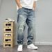 Spring American Casual Ruffian Handsome Retro Ripped Patch Jeans Men's Straight Loose Versatile Tapered Beggar Pants_mkmklike.com