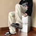 Men's High-Street Distressed Jeans – Slim Straight-Leg With Raw Hem & Flared Fit_mkmklike.com