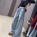 Women's Vintage Star-Embossed Flare Jeans – High-Waisted Wide-Leg Denim Pants With Rhinestone Detailing (Blue, Sizes S-XL)_mkmklike.com