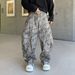 Men's Clothing Vintage Leopard Print Flared Jeans – 90s Streetwear Distressed Denim With Raw Hem & Splatter Wash (Unisex Oversized Fit, Non-Stretch)_mkmklike.com