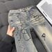 CATTEEIUS Vintage Washed Distressed Jeans – Retro Straight-Leg Denim Pants For Men & Women_mkmklike.com