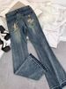 "American Retro Low-Rise Flared Jeans For Women – Vintage Distressed Denim, Embroidered High Street Style, Slim Fit & Floor-Length"_mkmklike.com