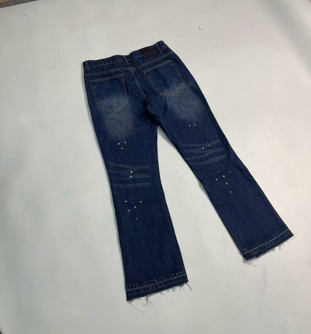 "Distressed Flare Jeans With Paint Splatter & Ripped Details - High Waisted Vintage Denim Pants With Raw Hem For Grunge Street Style"_mkmklike.com