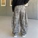 Men's Clothing Vintage Leopard Print Flared Jeans – 90s Streetwear Distressed Denim With Raw Hem & Splatter Wash (Unisex Oversized Fit, Non-Stretch)_mkmklike.com