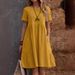 Women's clothing women's retro cotton and linen loose pocket solid color round neck dress in stock_mkmklike.com