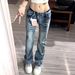 Low-Rise Flared Jeans For Women Streetwear Style Distressed Denim Pants With Raw Hem & Stretch Fit_mkmklike.com