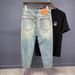 Men's Clothing New Light Colored Retro High End Ripped Jeans Men's Loose Tapered Slim Fitting Elastic Harem Nine Point Pants_mkmklike.com