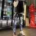 Personalized Printing European And American Splicing Beggar Ink-splashing Jeans Men's Slim-fitting Small Feet Ripped Trendy Brand_mkmklike.com
