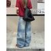 ICC Early Spring New Street Style Loose Fit Curved Hem Jeans With Washed Fading And Cat-Eye Effect For Women 10663_mkmklike.com
