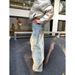 Unisex Loose Straight Leg Jeans American Retro Style Washed Whiskering Striped Scimitar Wide Leg Floor Length Trousers_mkmklike.com