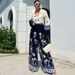 Women's clothing fashion positioning printed loose long-sleeved tops wide-leg pants two-piece set_mkmklike.com