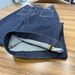 2026 Early Spring New European And American FD Style High-waisted Dark Blue Front Pocket Denim Flared Pants For Women_mkmklike.com
