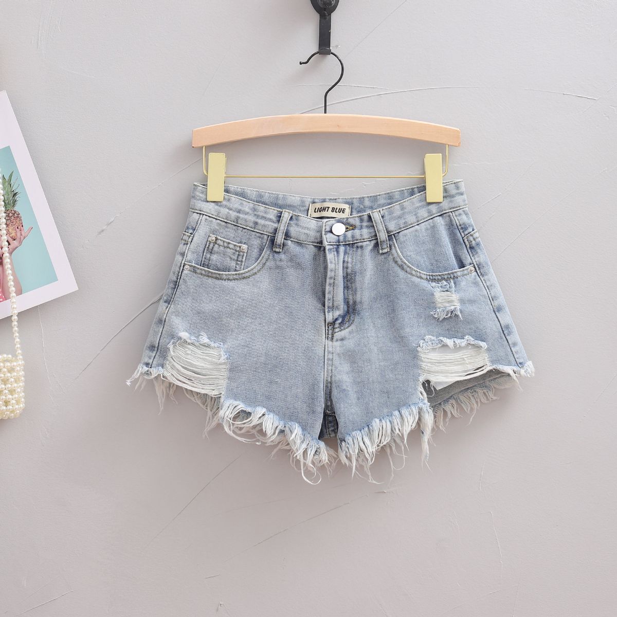 High Count Ripped And Fringed Denim Shorts for Women Trendy Hot Pants Summer Fashion Must-Have Stylish A-Line Mini Skirt for Bloggers_mkmklike.com