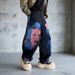 Men's Black Graffiti Jeans - Loose Fit Straight Leg Denim With Urban Color Block Design_mkmklike.com