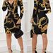Women's Clothing chain printed twisted irregular long sleeved v neck hip hugging dress_mkmklike.com