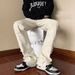 Men's High-Street Distressed Jeans – Slim Straight-Leg With Raw Hem & Flared Fit_mkmklike.com