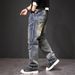 European And American Trendy Brand Multi Pocket Outdoor Retro Jeans Men's High Street Nostalgic Workwear Elastic Jeans Splicing Style_mkmklike.com