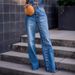 Women's High-Waisted Button-Fly Jeans – Raw Hem Distressed Denim Pants, Loose Fit Streetwear Style (Blue, S-4XL)_mkmklike.com