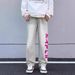 Washed Yellow Mud Embroidered Jeans American Hip-Hop Men's Trendy Brand Micro Flared Loose Straight Leg Pants_mkmklike.com