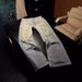 Men's Clothing Ac Style Ripped Yellow Mud Old Washed Dirty Pants Loose Flared Jeans For Men And Women_mkmklike.com