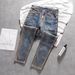 Korean Version Of Trend Light Luxury Small Feet Slim Denim Trousers Men's Thin Design Sense Personalized Paint Printing High-end Casual Trousers_mkmklike.com