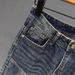 Men's Slim Fit Motorcycle Jeans Trendy Edgy Zipper Pockets Patchwork Design Tapered Leg mid Waist Blue Cotton Stretch Jeans_mkmklike.com